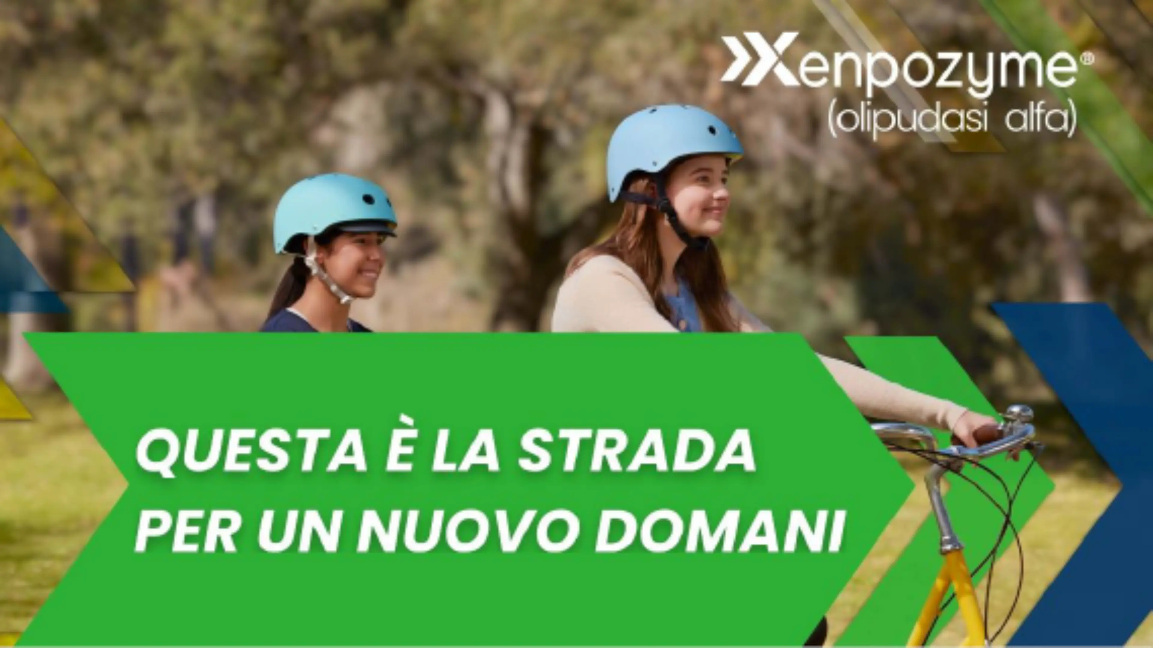 Immagine istituzionale di XENPOZYME (olipudasi alfa) che mostra due giovani pazienti pediatriche all’aperto mentre vanno in bicicletta con casco protettivo. L’immagine è accompagnata dal messaggio ‘Questa è la strada per un nuovo domani’.