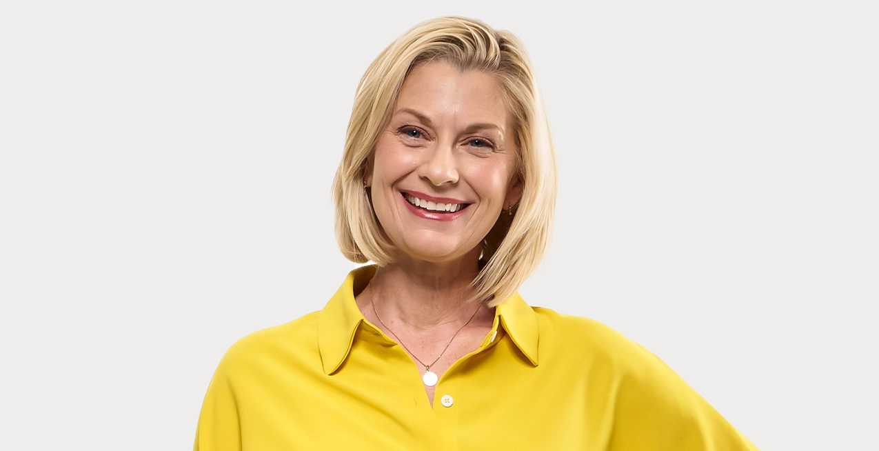 Woman with immune thrombocytopenia (ITP) smiles.
