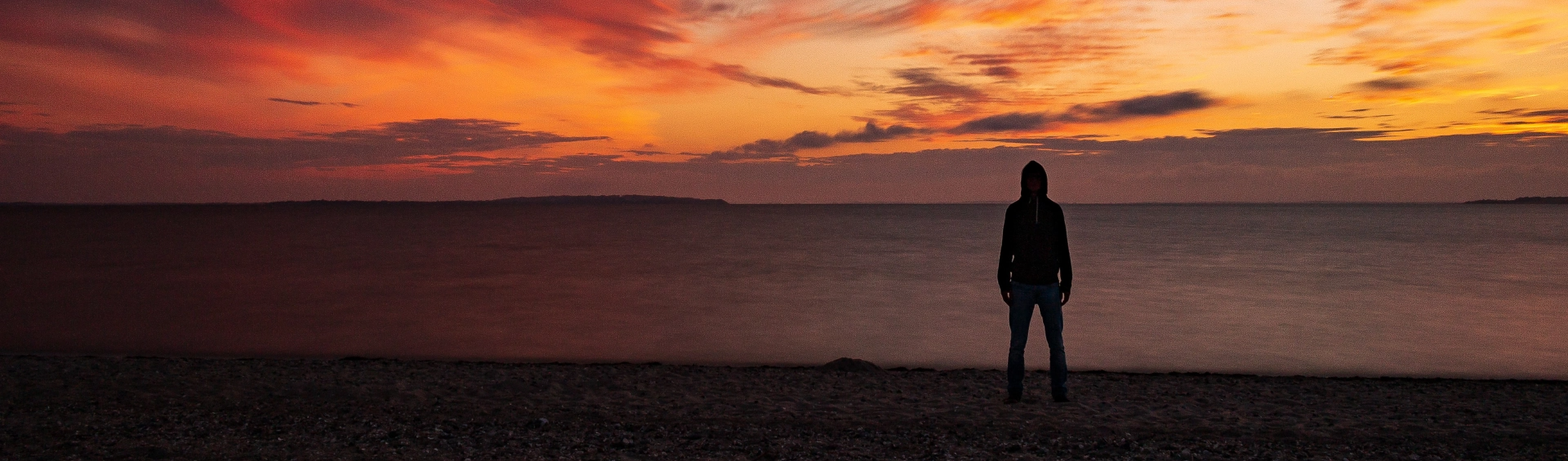 Menschliche Silhouette vor Sonnenuntergang als Symbolbild für den Patientenfall Kardiologie