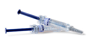 Two medical syringes with dark blue plungers and labeled text on them.