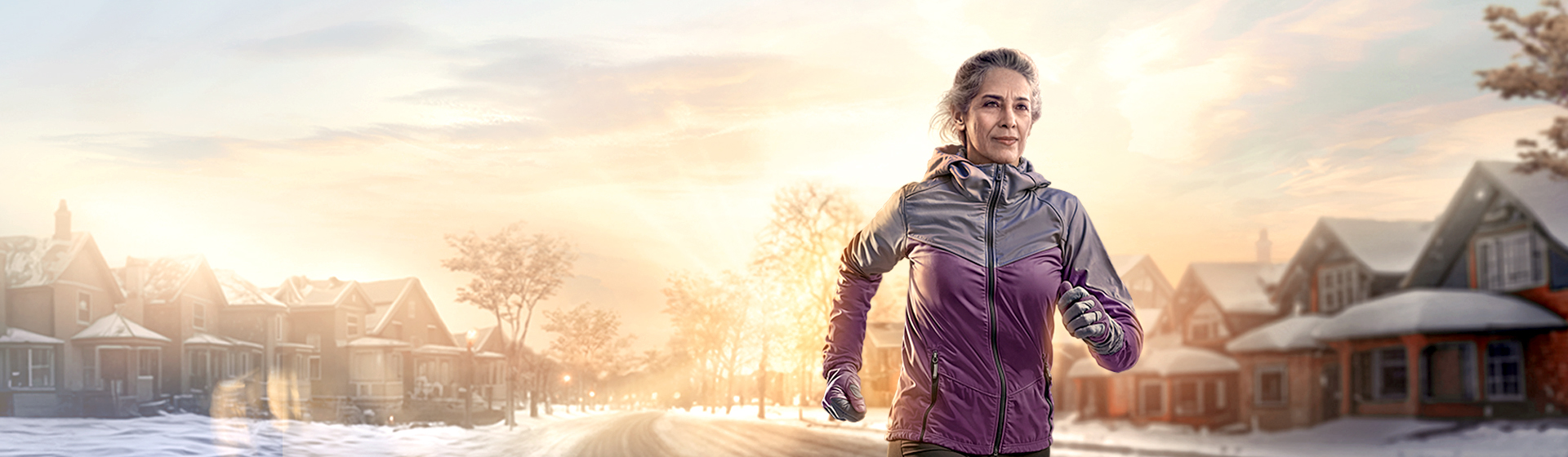 Elderly woman jogging on the road